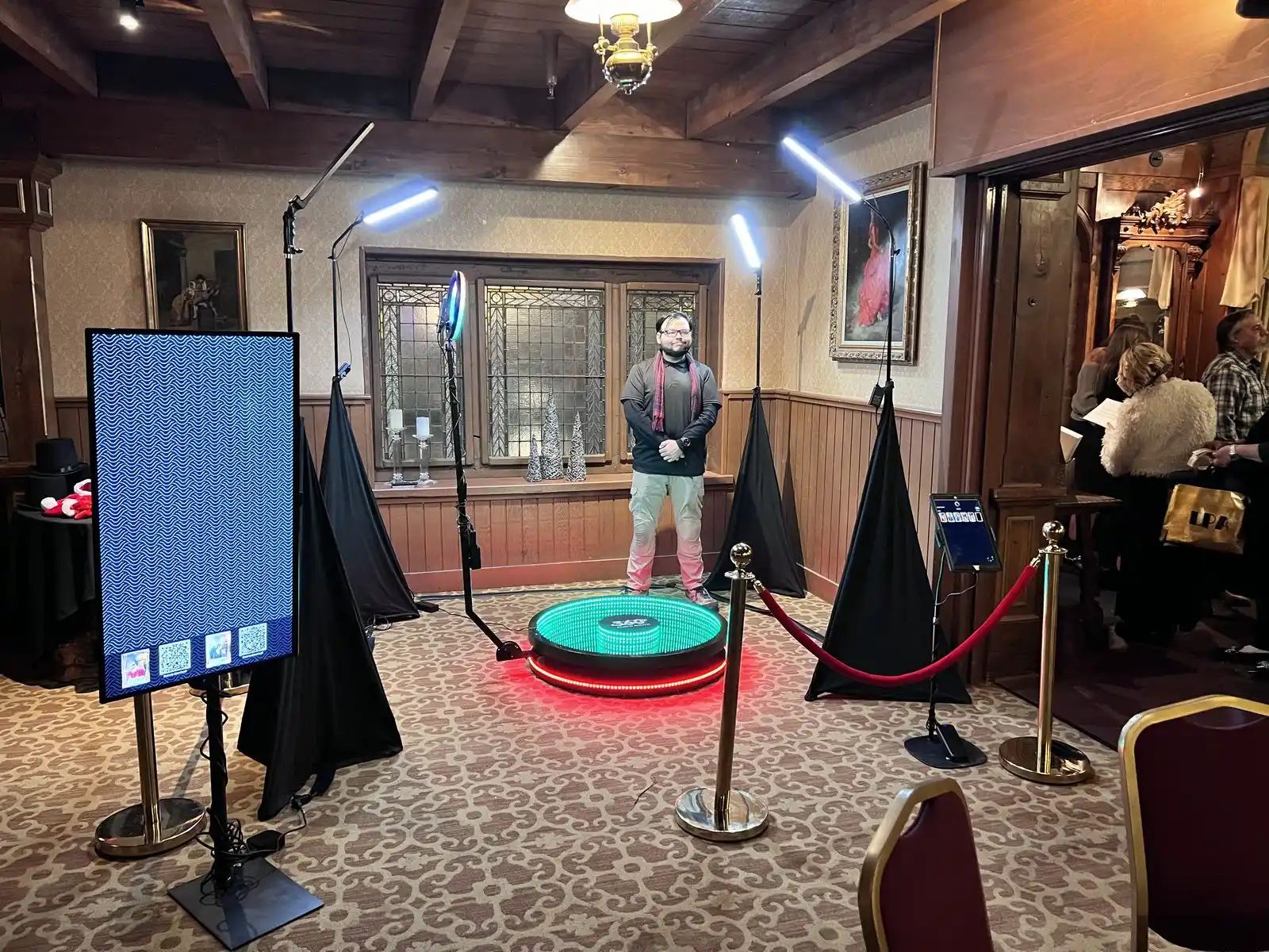Guests on the 360 video platform with the booth attendant